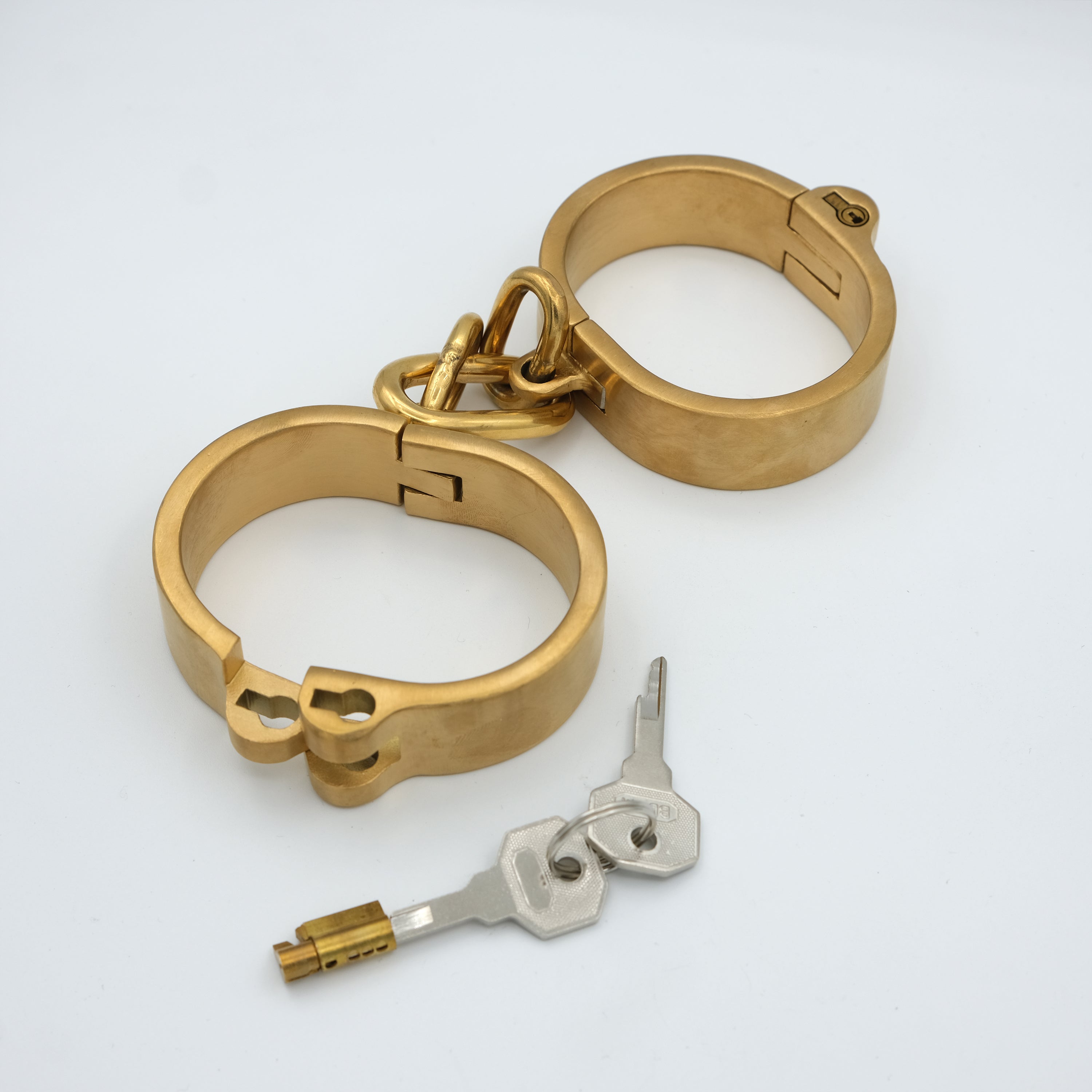 Push-in lock + spare key for collar, hand and ankle cuffs