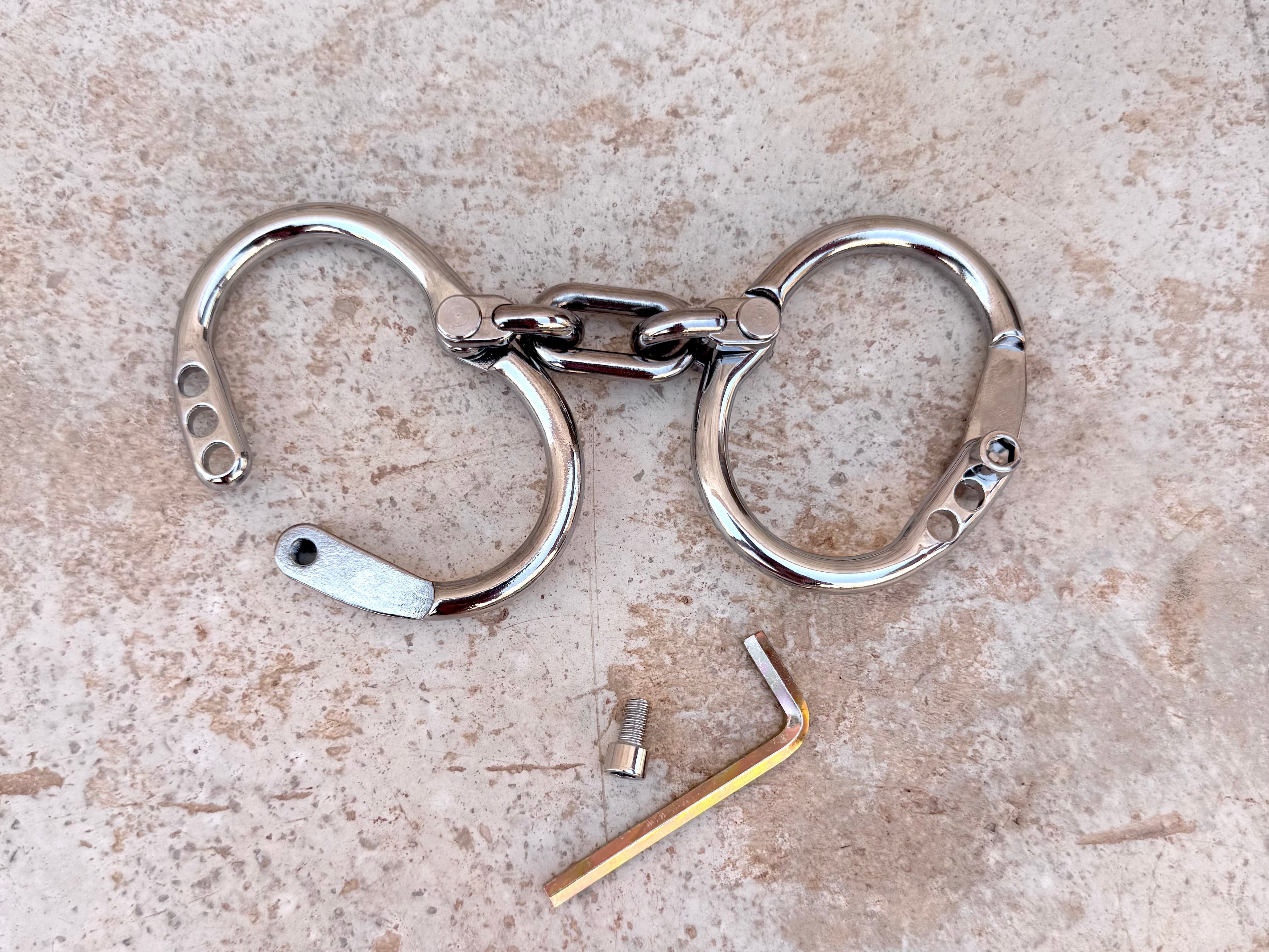 Innovative solid hand or legcuffs, adjustable