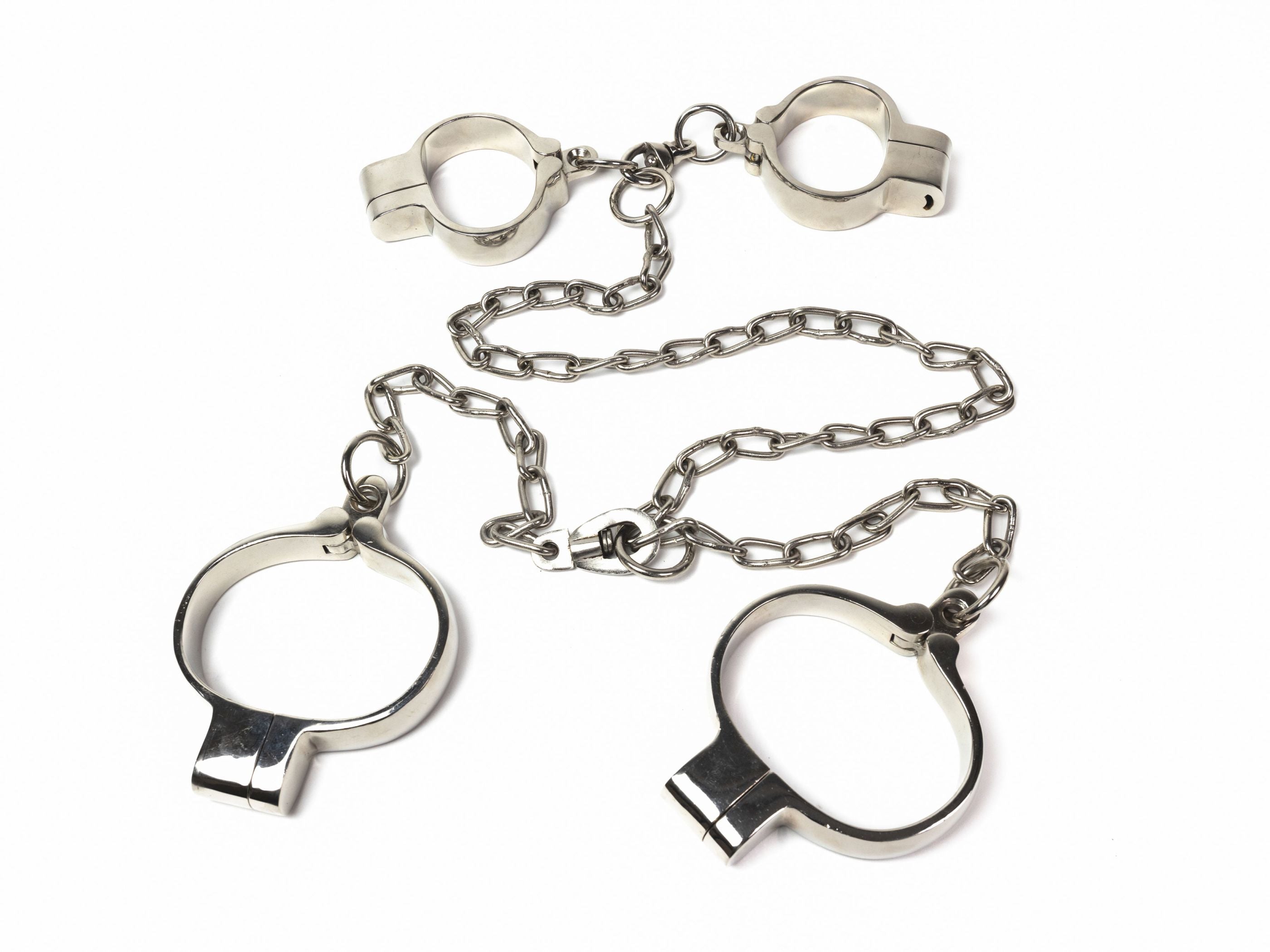 Heavy hand and leg irons with connecting chain
