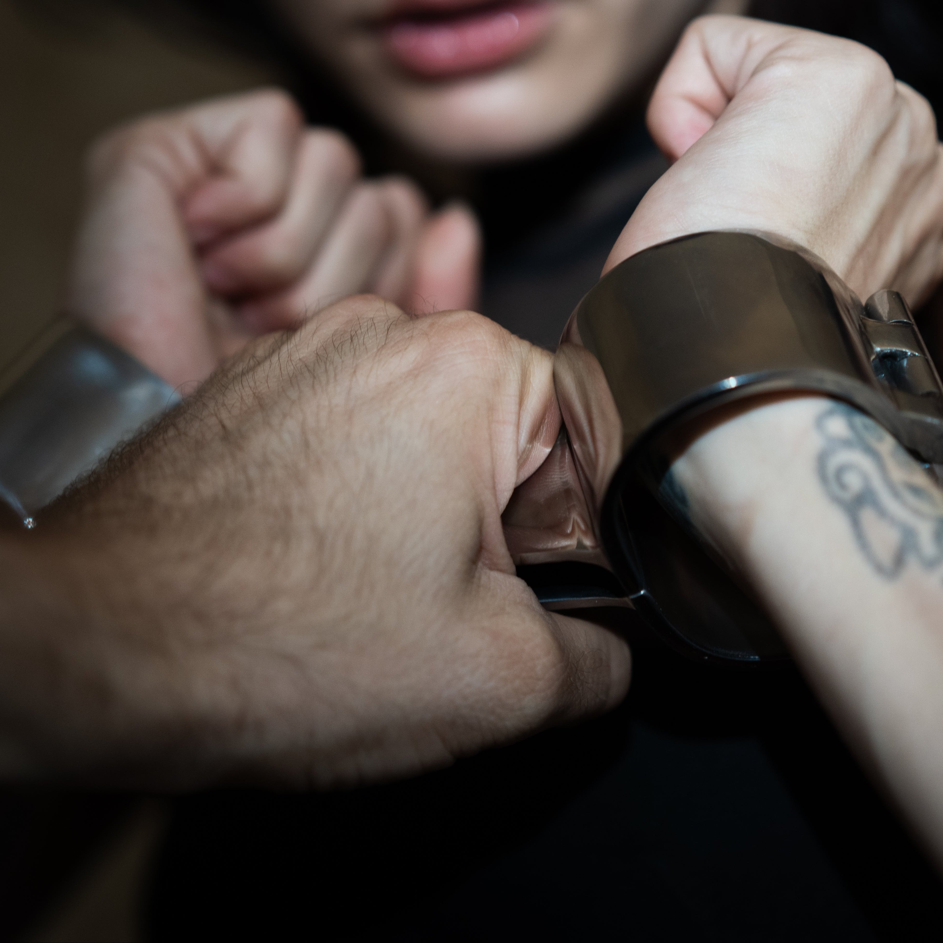 Angled stainless steel restraints with optional thumb extensions